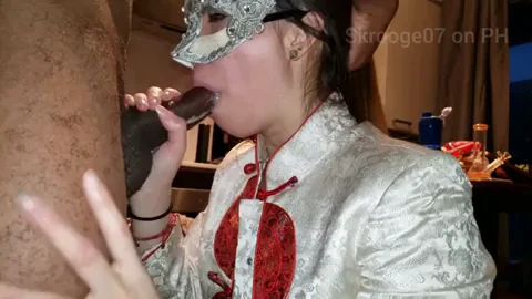 Chinese in traditional clothing sucking BBC. Sloppy bj