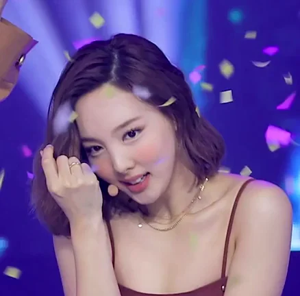 Nayeon's Naughty Tongue Tease in K-Pop Glow