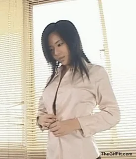 Revealing her boobs [gif]