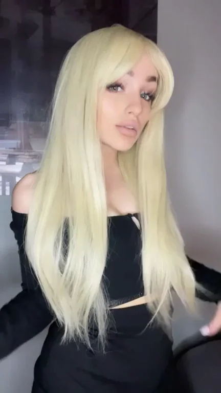 Blonde Bombshell's Massive Tits Tease - Make Her Day!