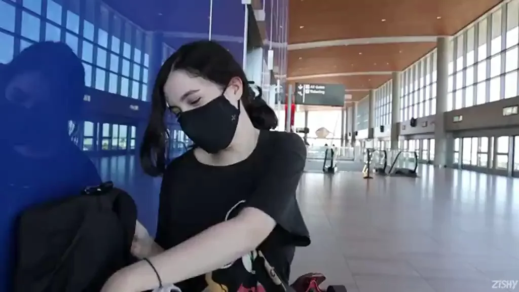 Busty Camgirl's Ballsy Airport Titty Drop Flash