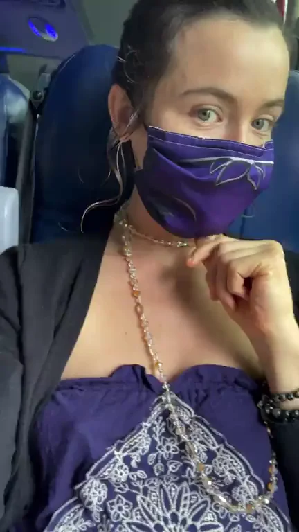 Bus Ride Risk: Masked Slut Flashes Perky Tits While Dude Sleeps