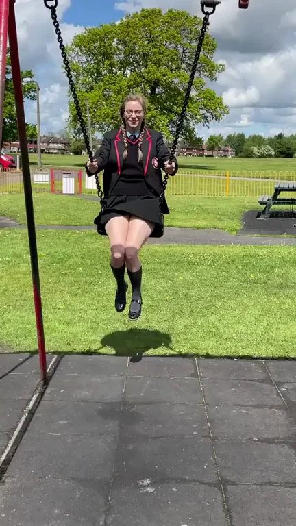 Naughty Schoolgirl Flashes Pussy on Playground Swing! 🔥👗💦