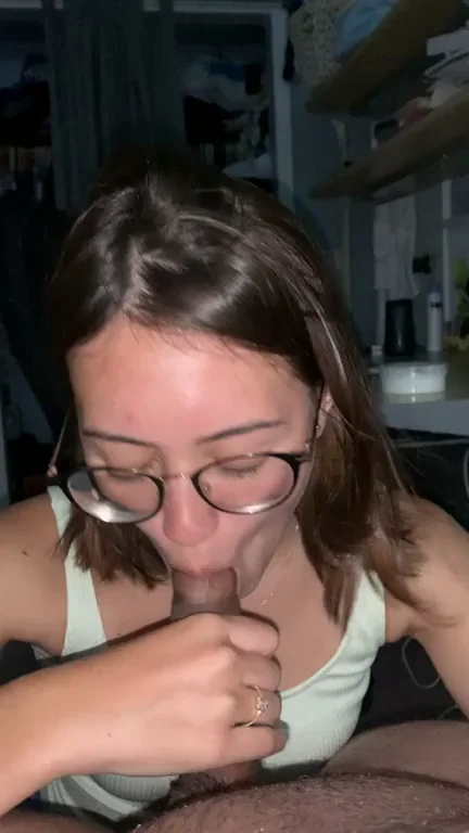 Glasses-Wearing Half-Asian Slut Worships Thick Cock with Her Hungry Tongue