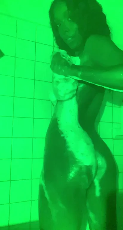 Dark Angel's Soapy Ebony Ass Tease in Neon Shower Glow