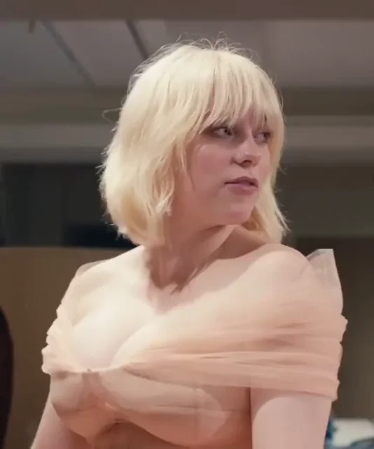 Billie Eilish looking very busty