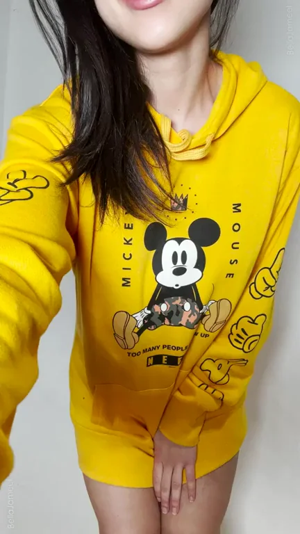 Wanna guess what's under my hoodie?