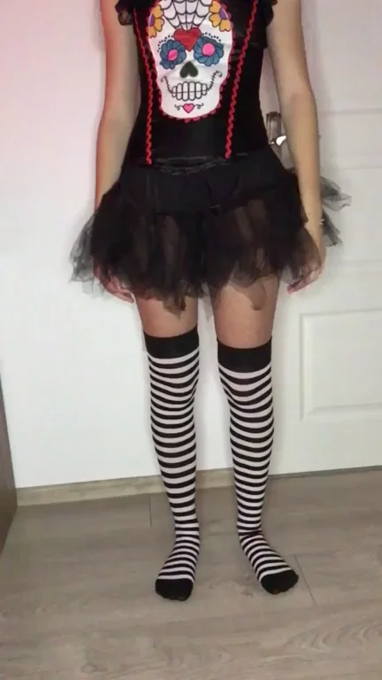 Pantyless Sugar Skull Slut Teases in Thighhighs – Skirt Up, Pussy Out!