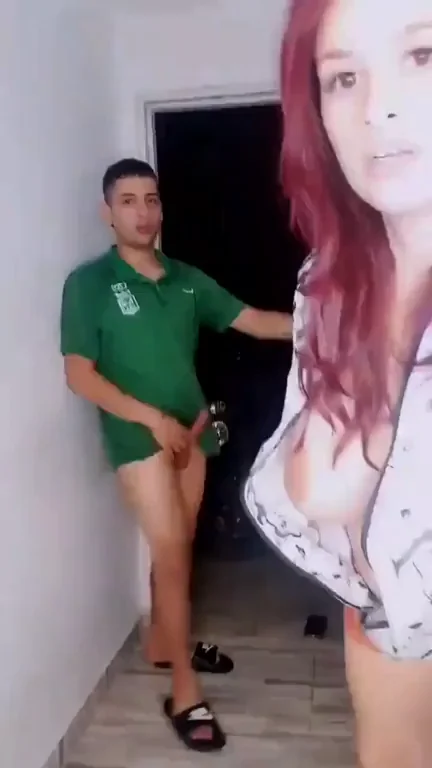 Busty Redhead Slurps Throbbing Cock at Open Front Door with Passersby Peeking