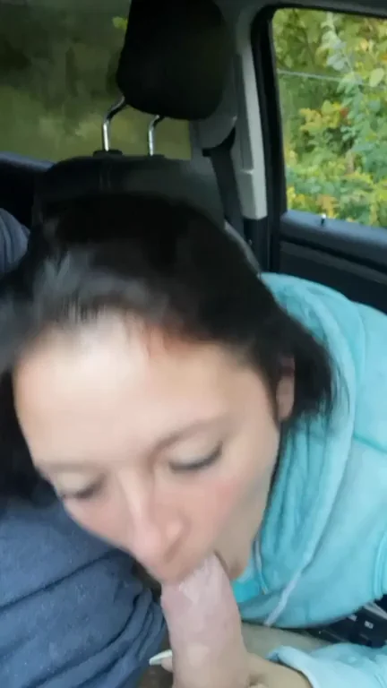 Big-Titty MILF Devours Thick Cock in Steamy Car Blowjob