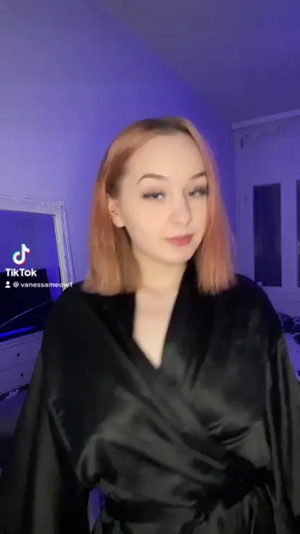 TikTok Tease: Redhead's Naughty Silk Slip 'n' Tit Flash