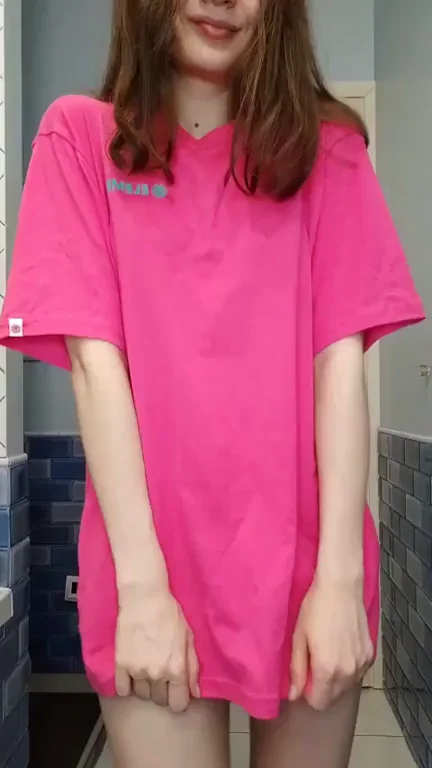 Tiny Slut's Shocking Titty Drop and Pussy Reveal in Pink Tee
