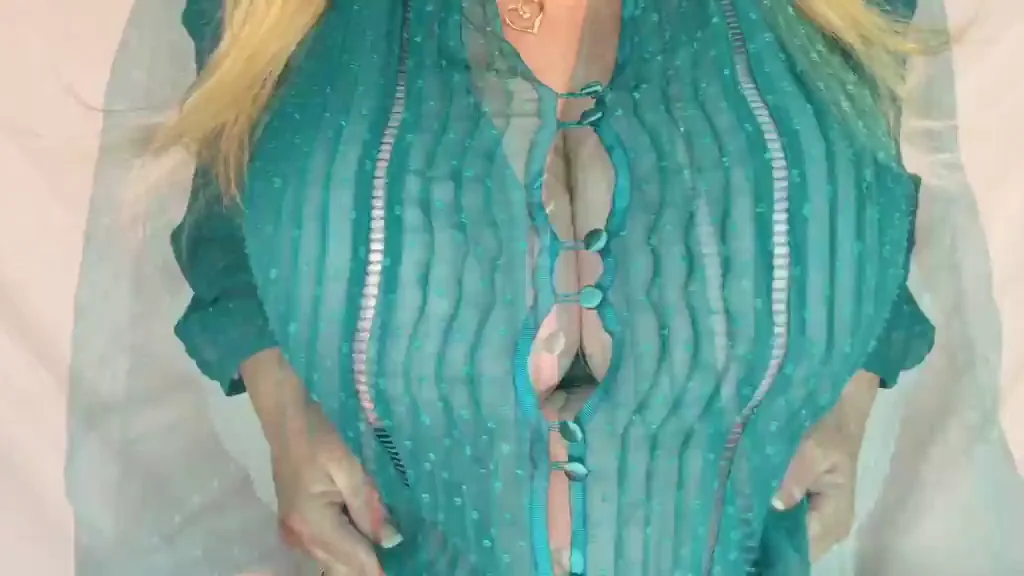 Massive tits button popping