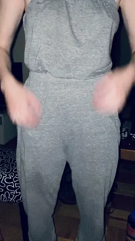 Sexy Babe Peels Off Jumpsuit to Flash Perky Tits and Bushy Pussy