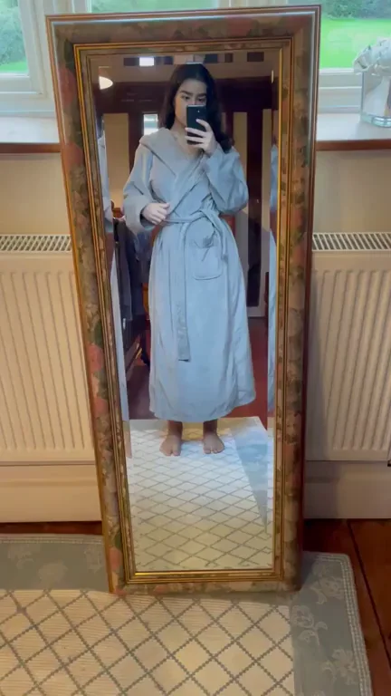 The mirror frame makes it look like I’m a painting undressing
