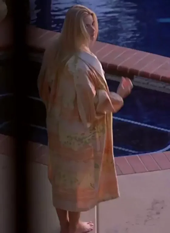 19-year-old Jaime Pressly swimming in only a thong 1997