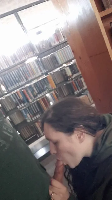 Office MILF Slurps Cock Between Shelves 😈💦