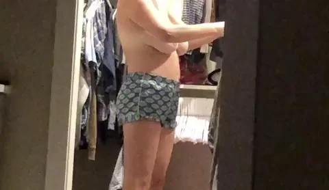 Wife shaking her titties for me while getting dressed