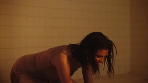 Selena on all fours