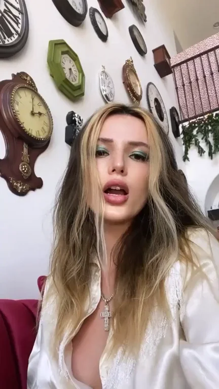 Bella Thorne is teasing her titty and is ready to catch your load