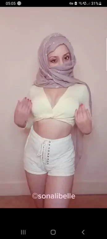 Oops.. My clothes don't like to stay on.. but at least my Hijab is still on.. lol.
