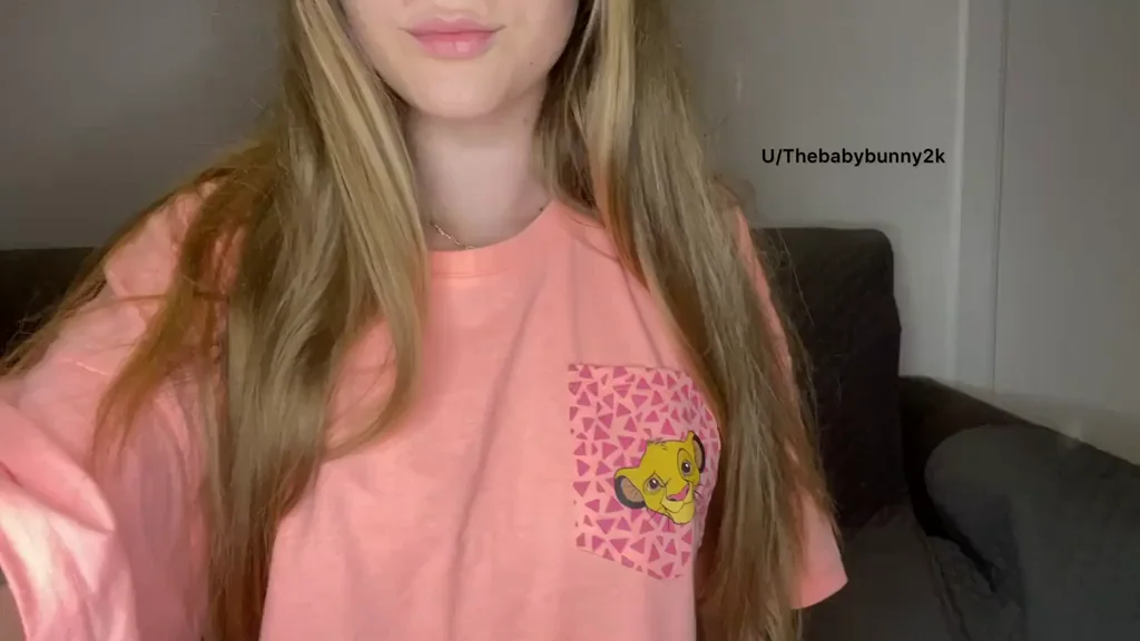 Sweet Blonde Teen's Perky Nipple Tease in Pink Tee