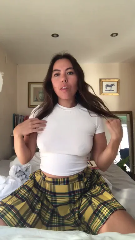 Pokies Tease: White Shirt, No Bra, Plaid Skirt Slut Vibes