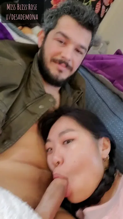Asian slut snuggling with white cock