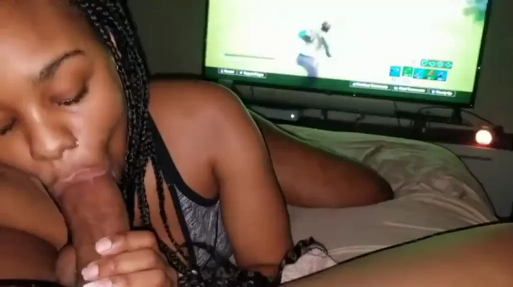 In her mouth while playing Fortnite.
