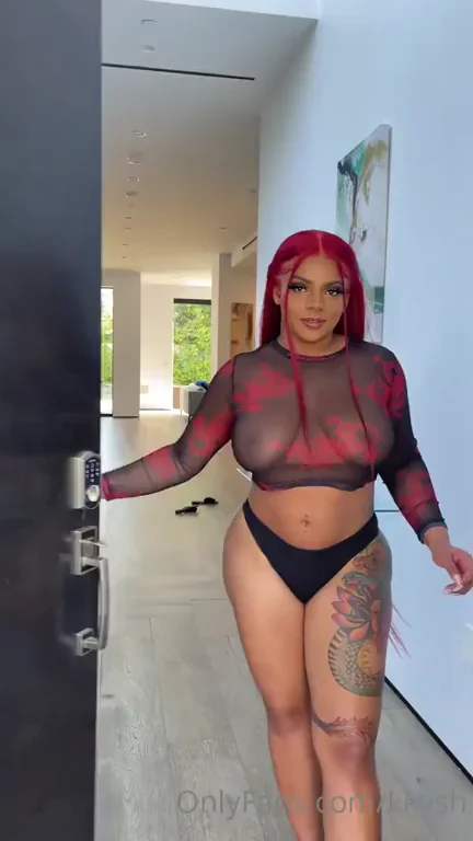 Juicy Redhead Ebony Babe Teases Tits and Pussy at the Door