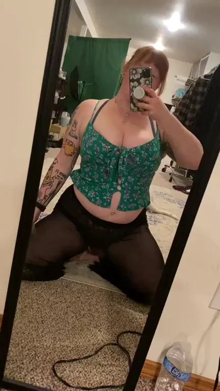 Curvy Redhead's Teasing Squat: Wish I Was Bouncing on Your Cock