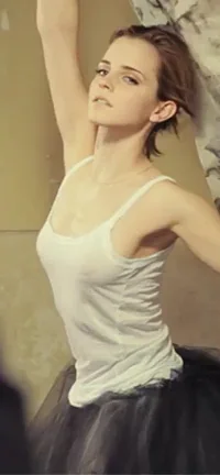 Emma Watson's Braless Tits Tease in White Tank Top 💦👅