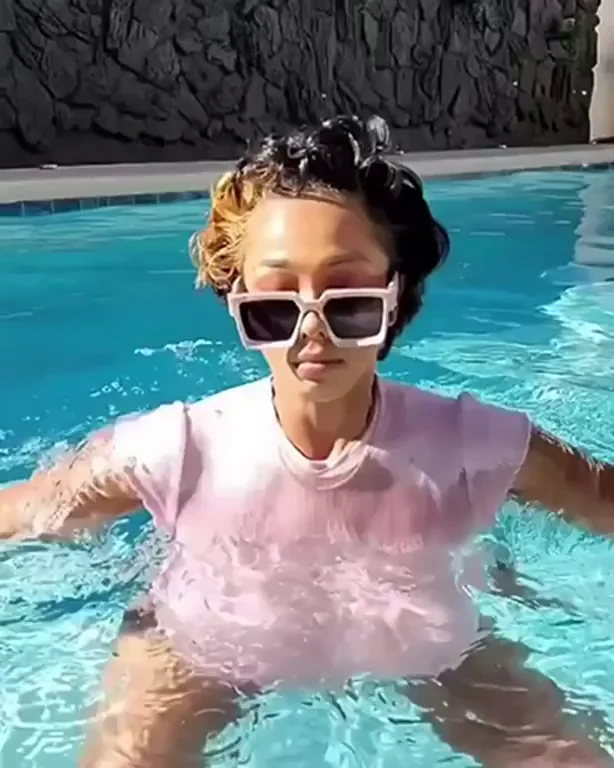 🔥 Dripping Wet Ebony Bombshell's Massive Tits Fresh from the Pool 💦🍈🍈