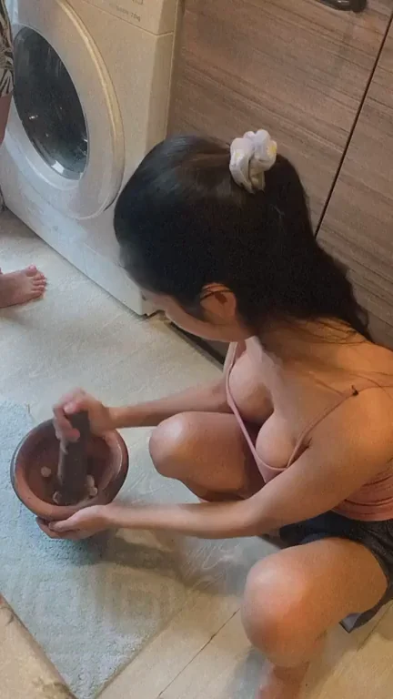 Cute Asian Cam Slut Smiles While Mixing Up Her Creamy Bowl Treat