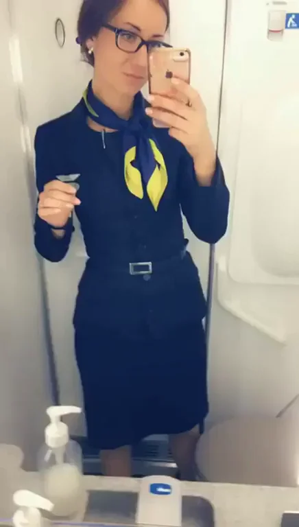 Mystery Flight Attendant's Naughty Upskirt Selfie Tease