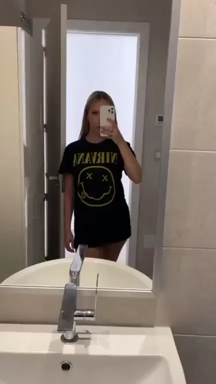 Sleepover Tease: 19yo Slut in Smiley Face Mini Shows Off Her Juicy Curves
