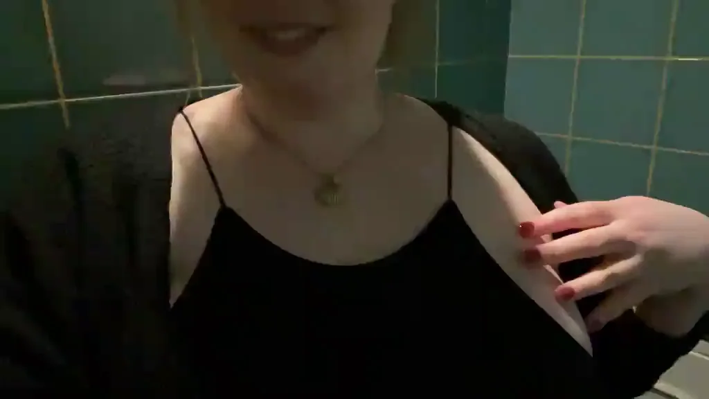 Date Night Quickie: Slut Sneaks Off to Flash Tits in Bathroom GIF