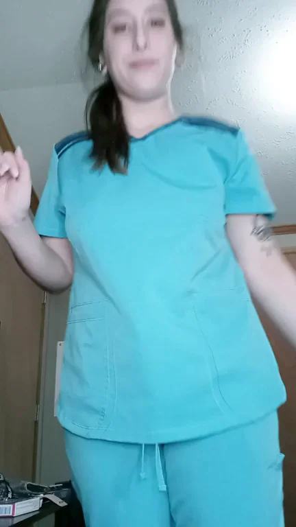 Nurse Slut's Braceless Tease: Massive Tits Straining Scrubs for Long Shift
