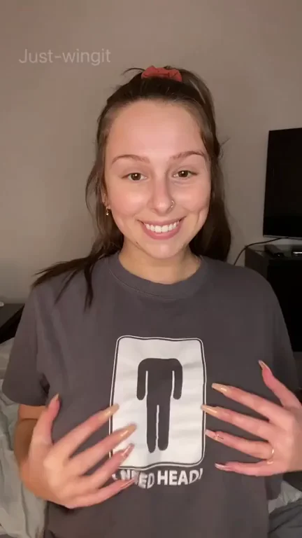 Busty Brunette Tease: Massive Tits Spill Out! 🔥🍒