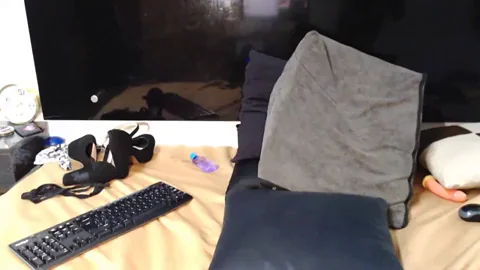 Busty Asian Booty Tease on Webcam Desk