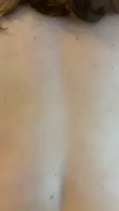 Wife trying to muffle her moans as I cum inside her.