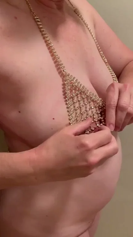 My kitty's nipples poke through the mesh of her metal bra