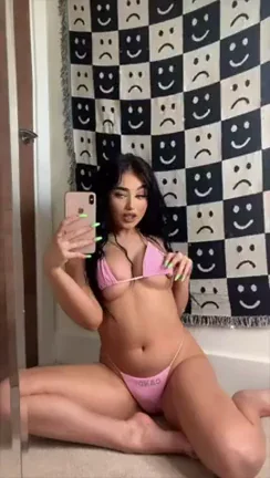 Pink Bikini Tease: Tits or Pussy Reveal?
