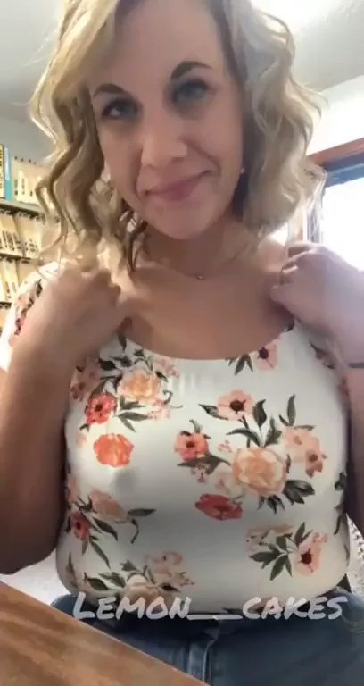 Office Tease: Busty Blonde Flashes Massive Tits