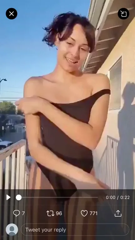 Hot Asian Babe Teasing Topless on Balcony