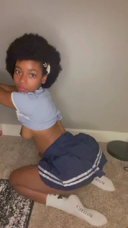 Level Up with This Curly-Haired Skirt Slut 🍑🔥