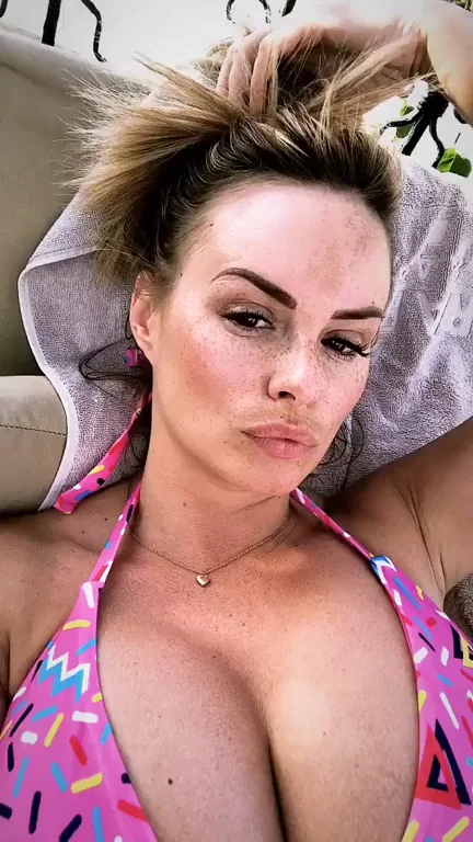 Stranger Tits: Busty Blonde Slut Teases in Psychedelic Pink Bikini