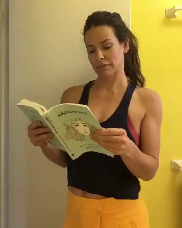 Evangeline Lilly's Mommy Tease: Ripped Tank and Skirt Begging for Brutal Pounding