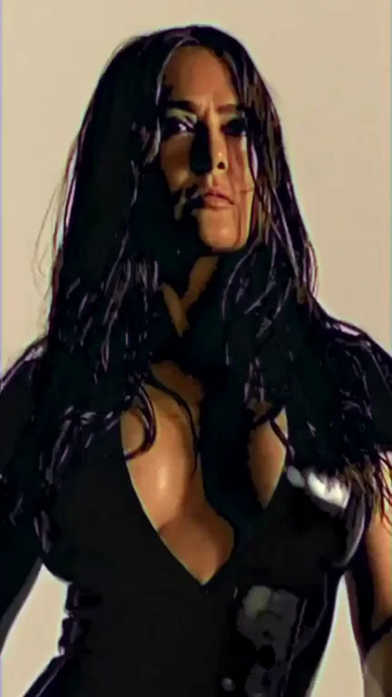Salma Hayek's Shiny Latex Tits Tease