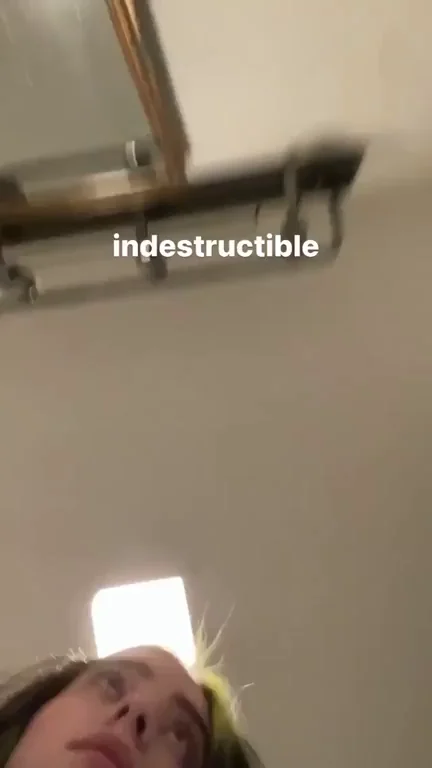 Billie Eilish slapping her boobs proves to me she likes it rough